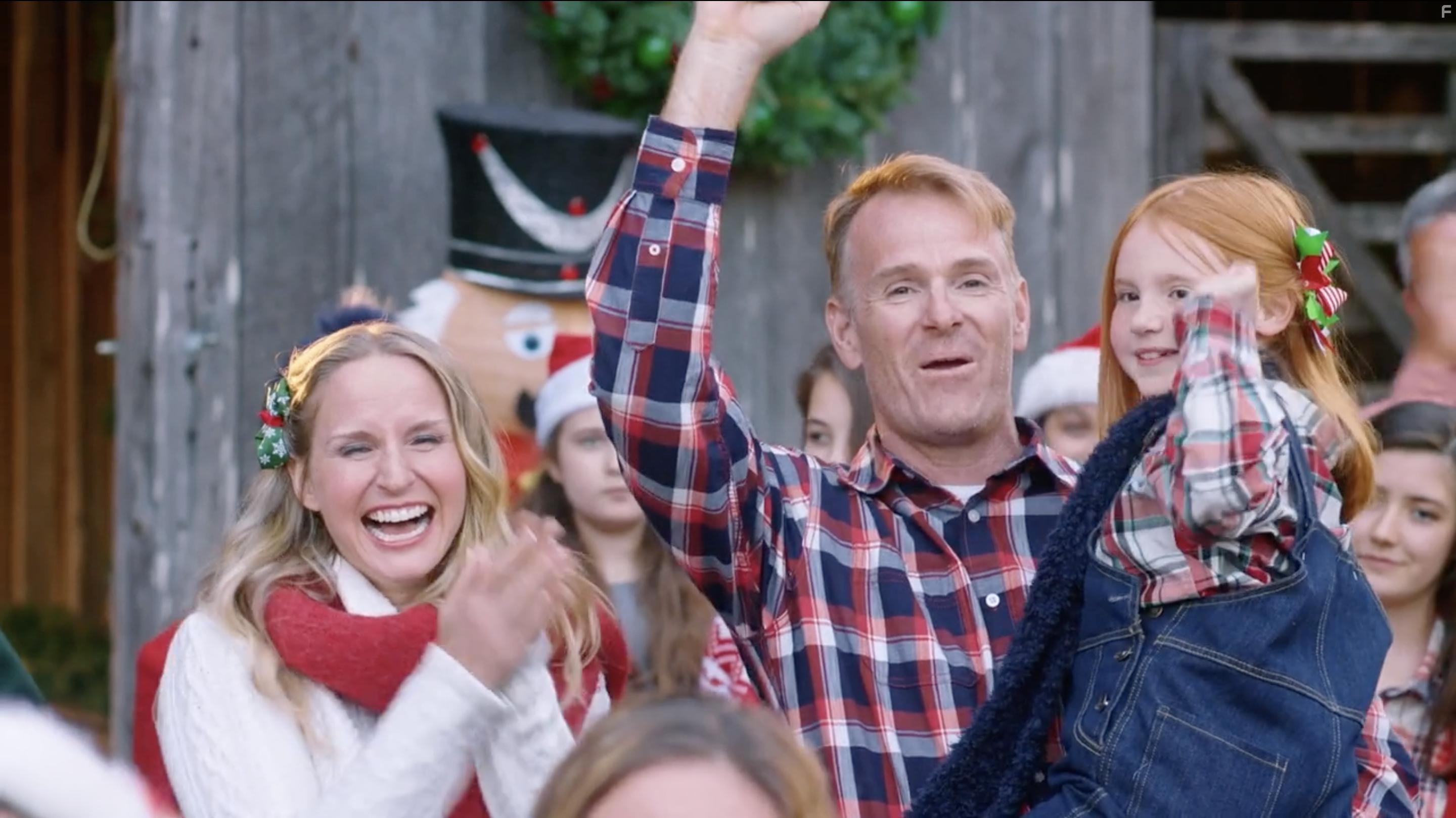 Jenn Gotzon, Jim E. Chandler, and Adele Chandler in The Farmer and the Belle: Saving Santaland (2020)