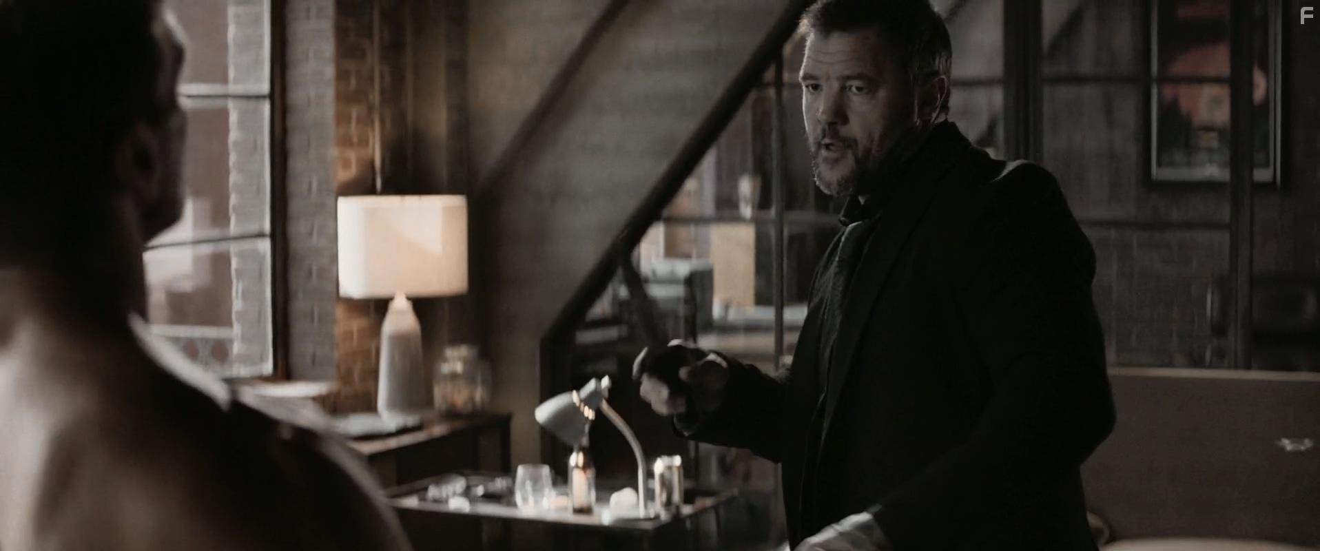 Frank Grillo and Buster Reeves in Boss Level