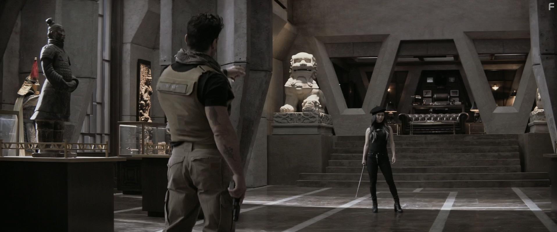 Frank Grillo and Selina Lo in Boss Level