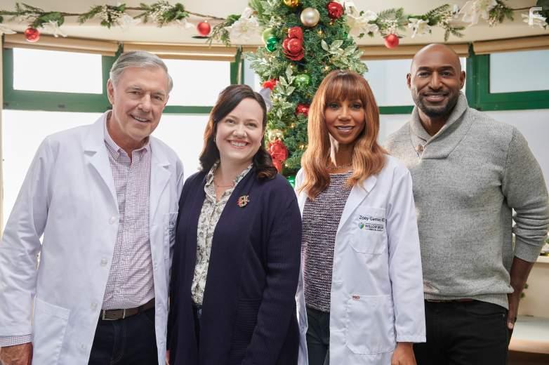 Holly Robinson Peete, Fred Henderson, Adrian Holmes, and Bronwen Smith in The Christmas Doctor (2020)