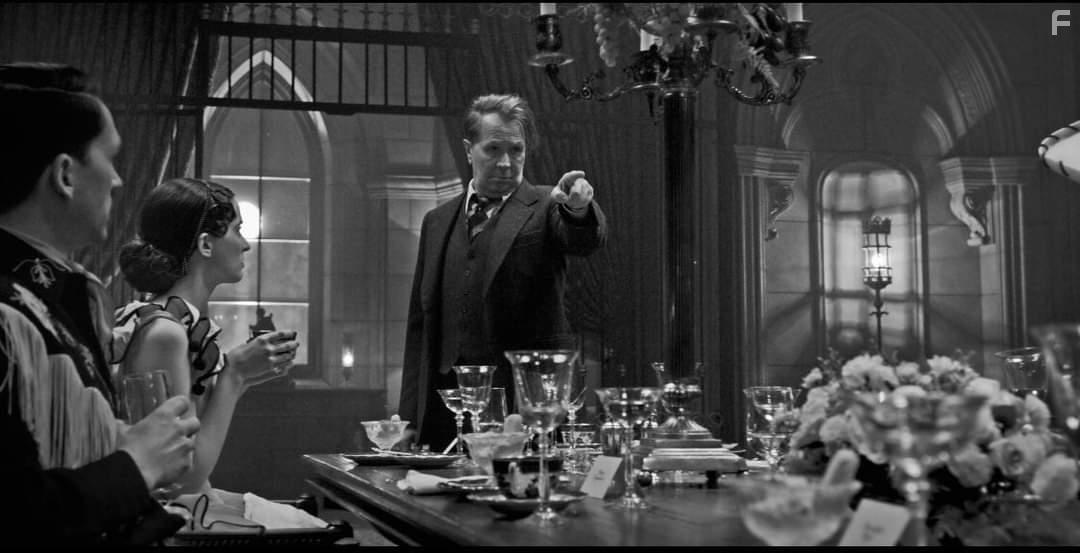 Gary Oldman and Lily Collins in Mank (2020)