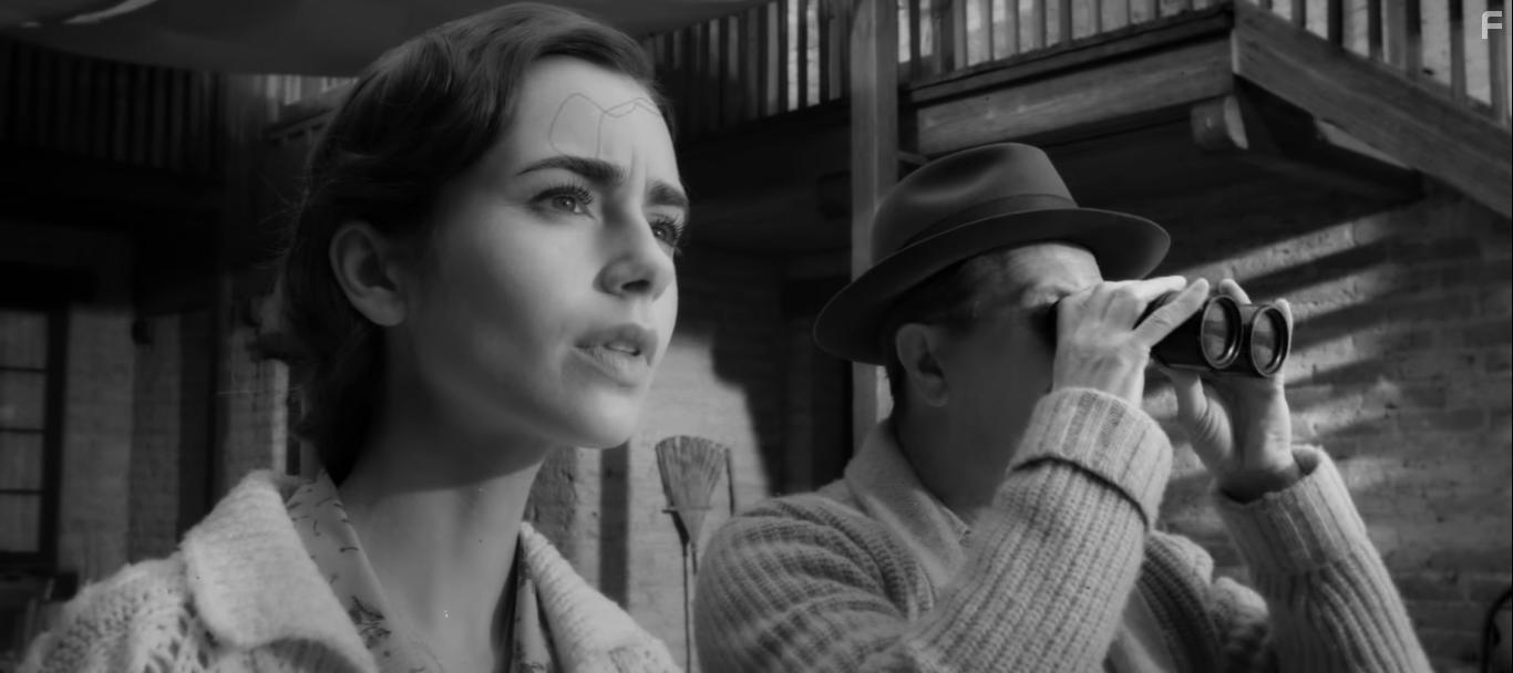 Gary Oldman and Lily Collins in Mank (2020)