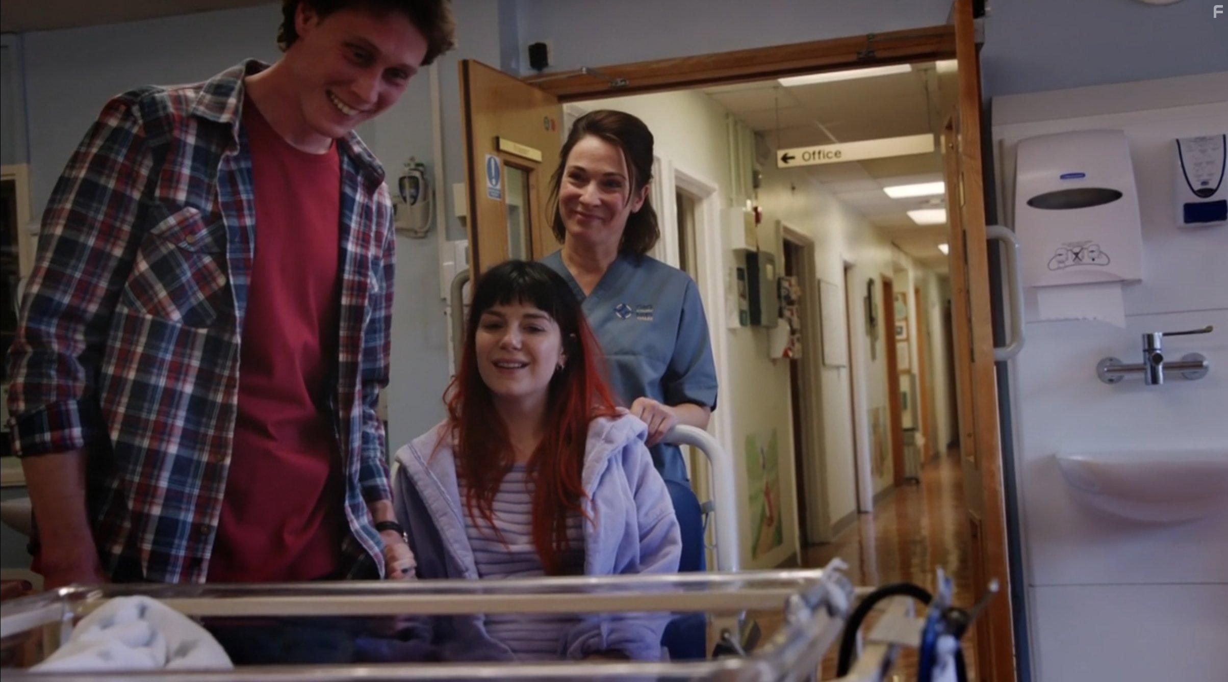 George MacKay and Aimee-Ffion Edwards in To Provide All People (2018)