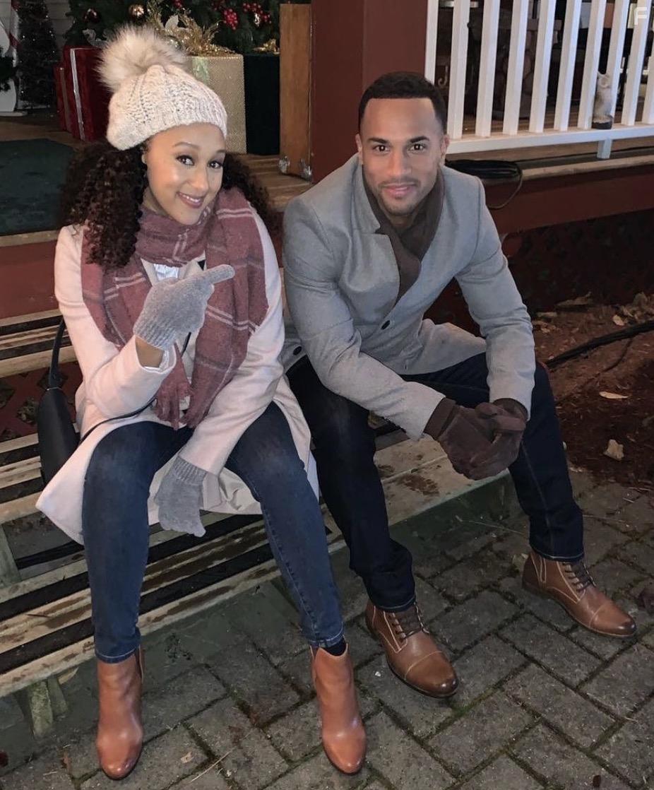Tamera Mowry-Housley and Michael Xavier in Christmas Comes Twice (2020)