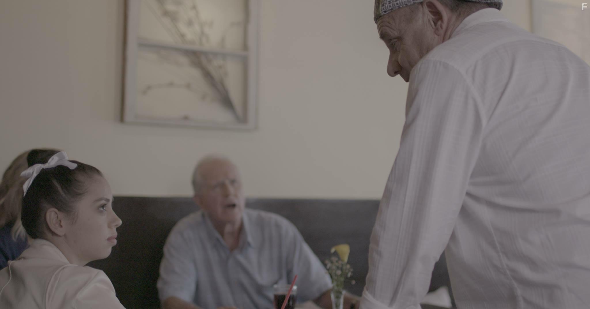 Paul Guilfoyle and Raquel McPeek Rodriguez in Turnover (2019)