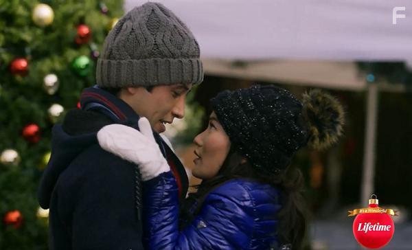 Jacky Lai and Tony Giroux in A Sugar & Spice Holiday (2020)