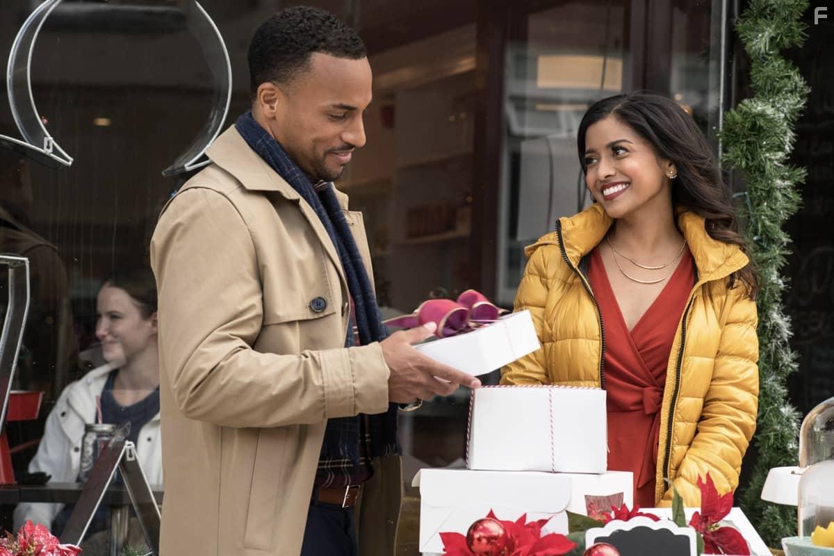 Tiya Sircar and Michael Xavier in Christmas on Wheels (2020)