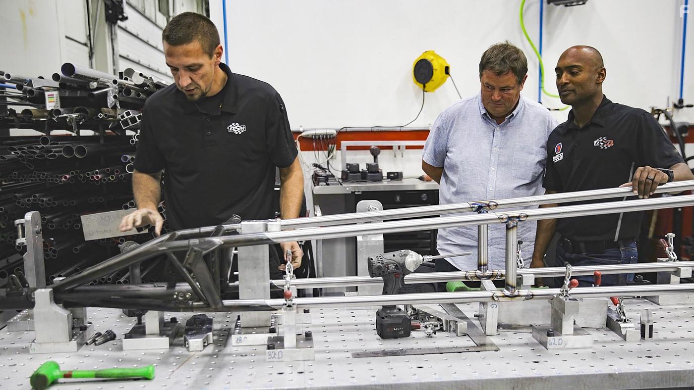 Mike Brewer and Antron Brown in World of Cars (2020)