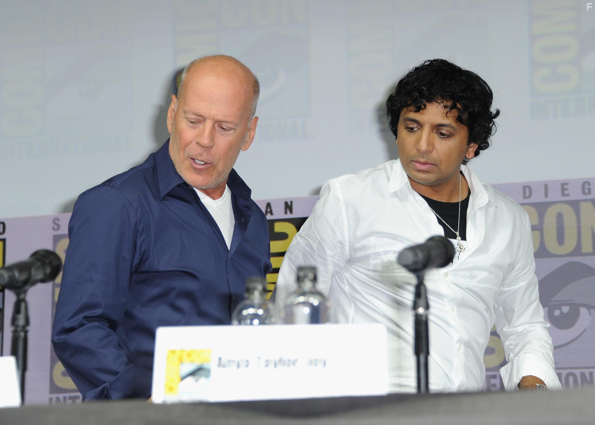 Bruce Willis and M. Night Shyamalan at an event for Glass (2019)