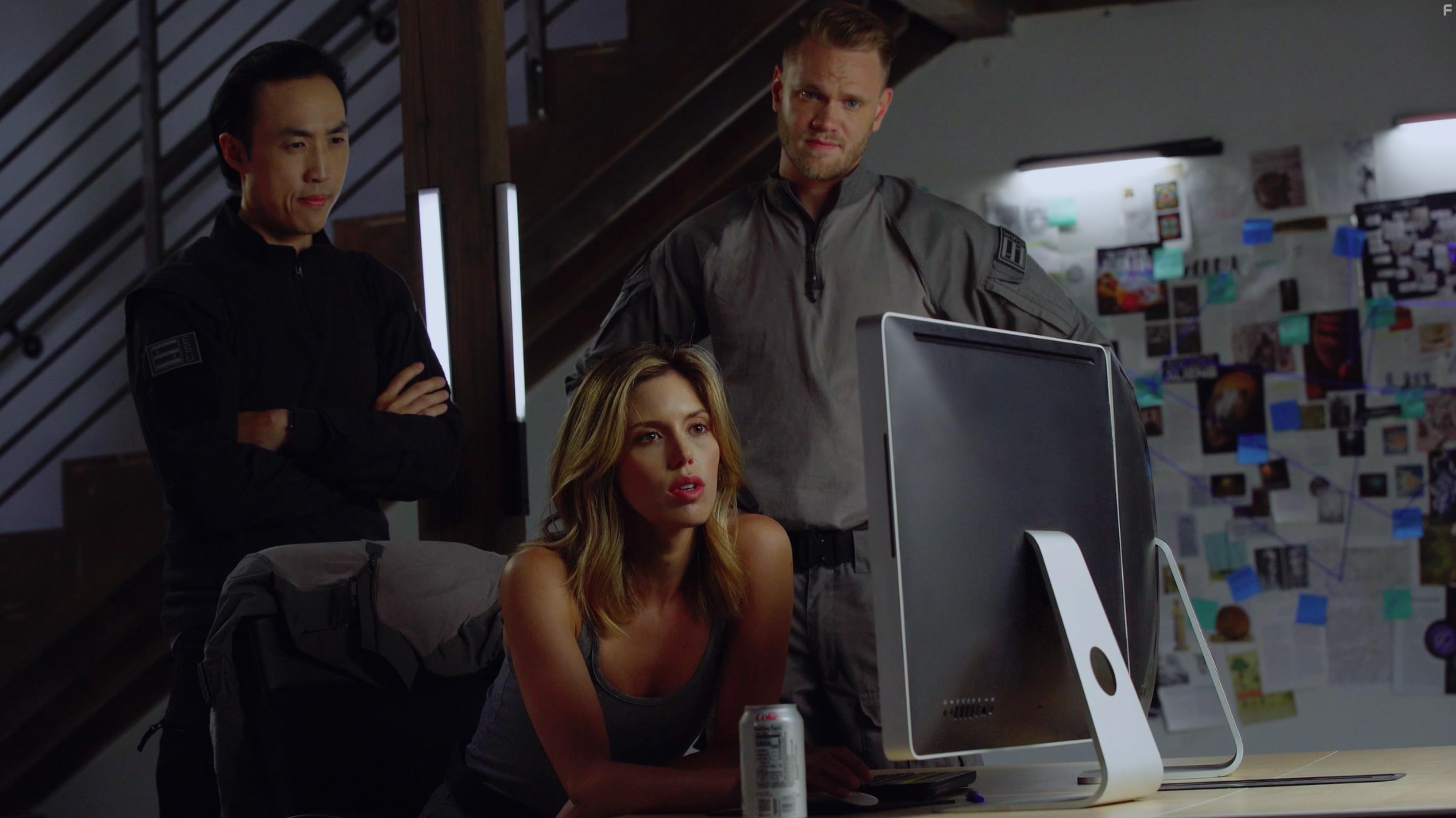 Kayla Ewell, Derek Ting, and Matthew Ryan Burnett in Agent Revelation (2021)