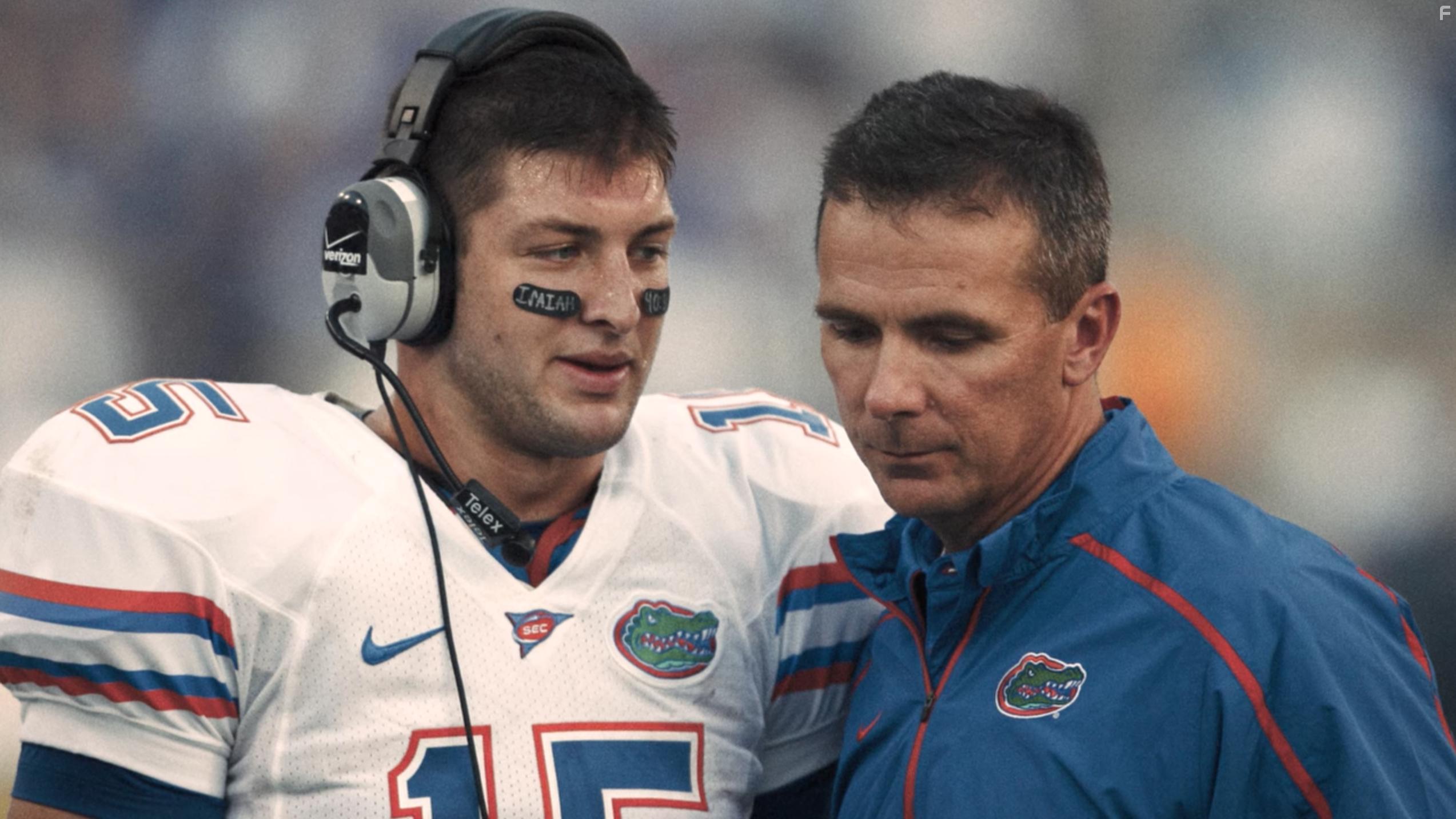 Urban Meyer and Tim Tebow in Killer Inside: The Mind of Aaron Hernandez (2020)
