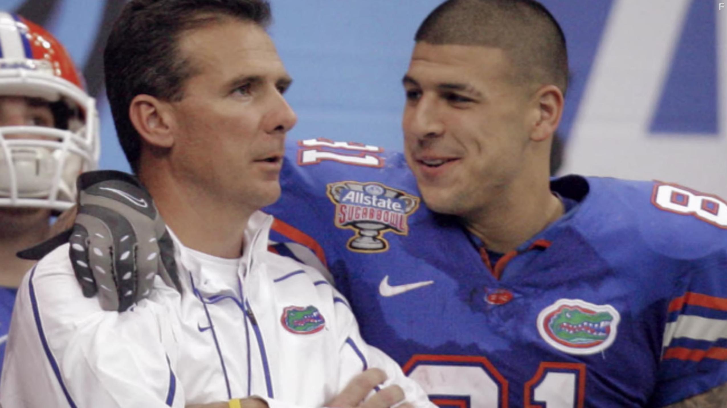 Urban Meyer and Aaron Hernandez in Killer Inside: The Mind of Aaron Hernandez (2020)