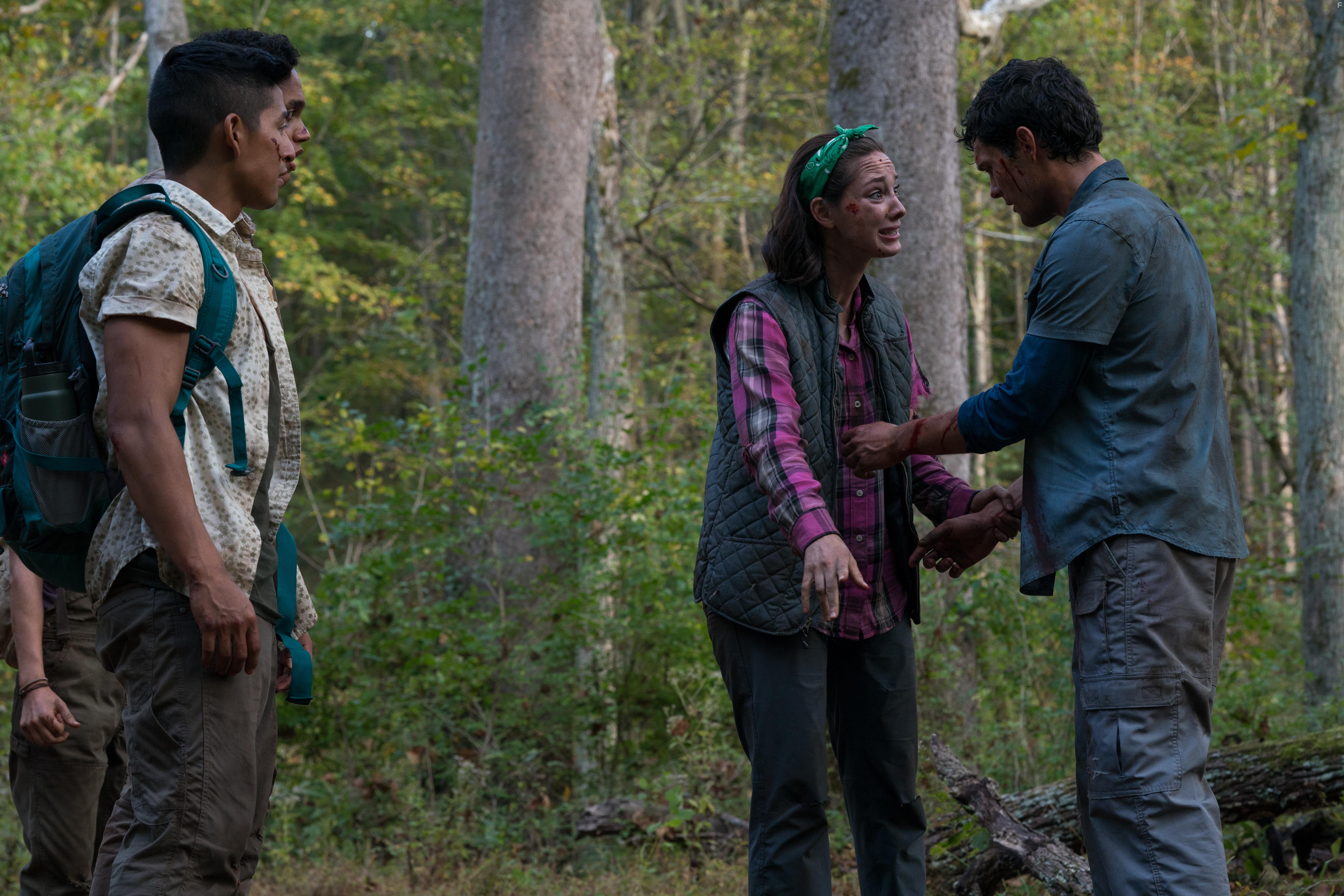 Emma Dumont, Dylan McTee, and Adrian Favela in Wrong Turn (2021)