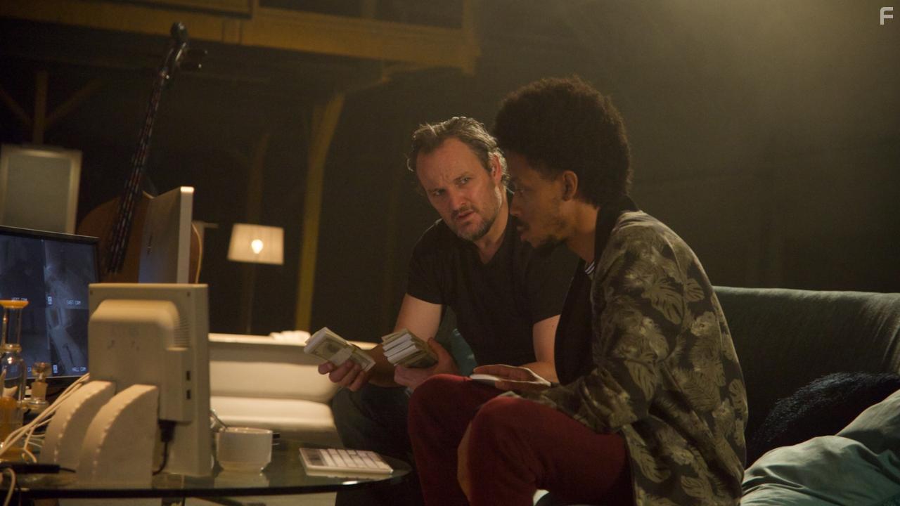 Jason Clarke and Darrell Britt-Gibson in Silk Road (2021)