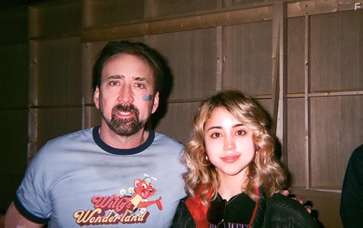 Nicolas Cage and Caylee Cowan in Willy's Wonderland (2021)