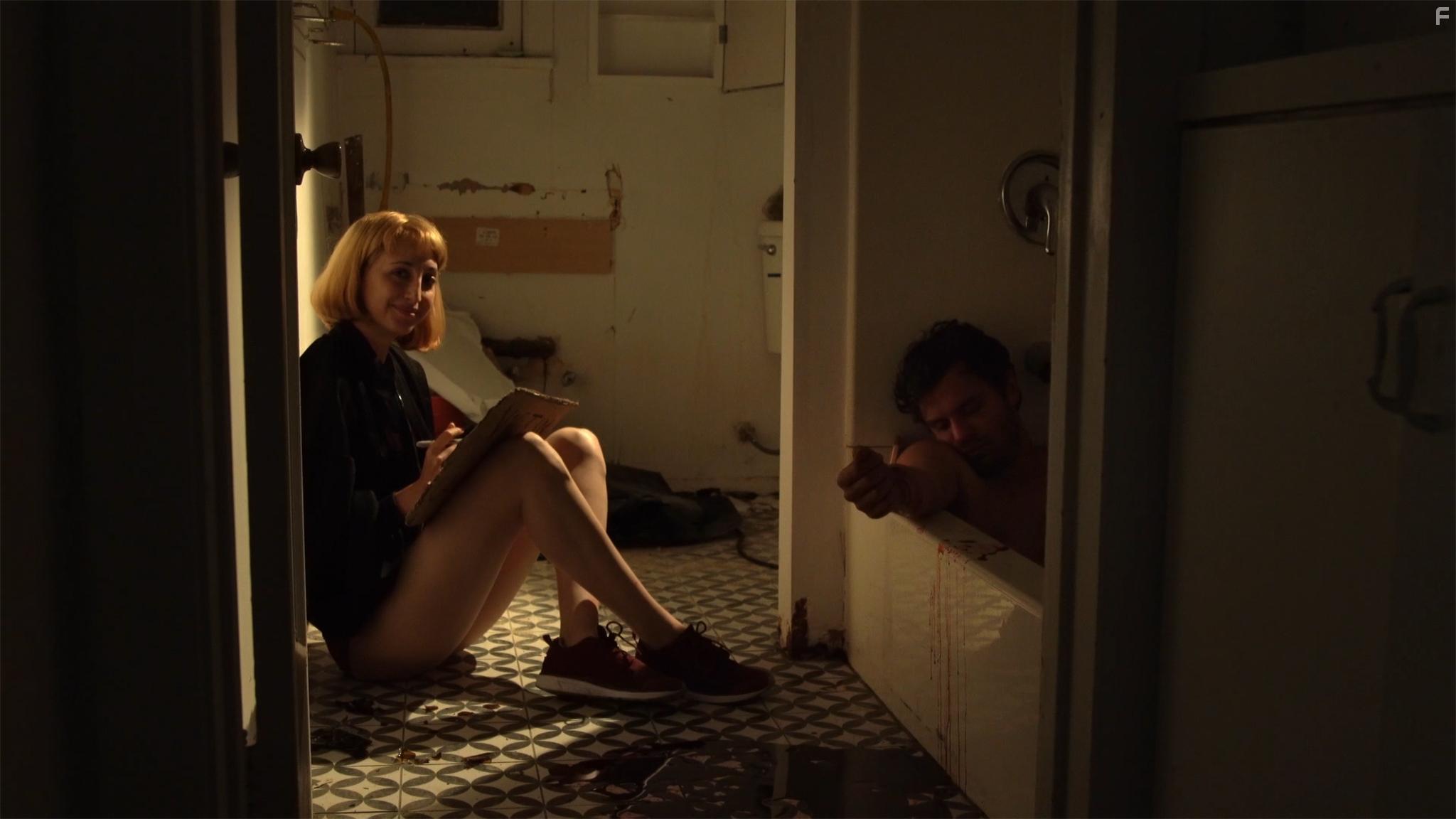 Garrett Coffey and Gillian Wallace Horvat in I Blame Society (2020)