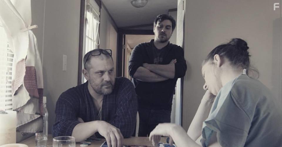 Whitney Wickham, James Timothy Peters, and Tyler Mills in Cashing Out (2020)