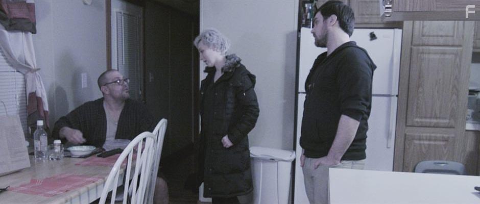 Michaela Lichvanova, James Timothy Peters, and Tyler Mills in Cashing Out (2020)