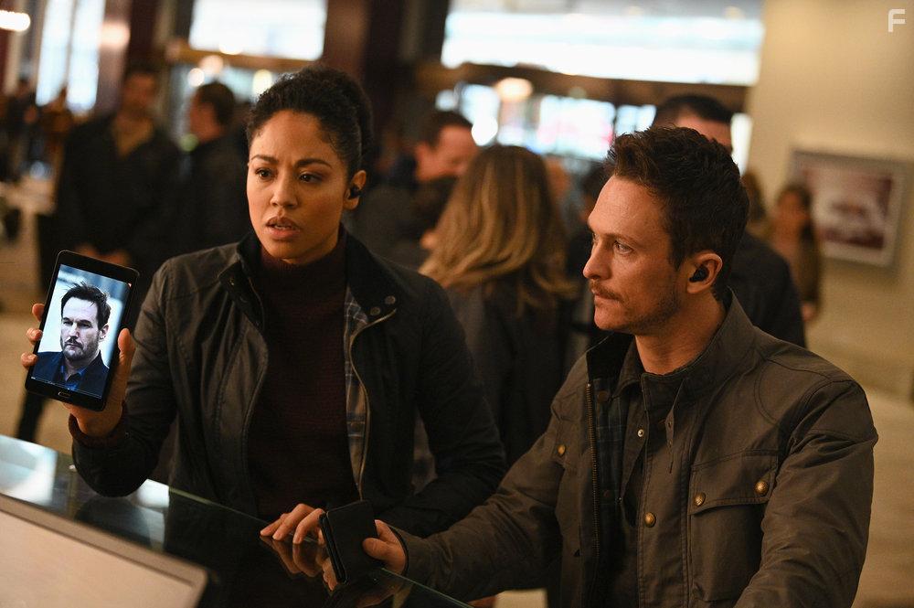 Jonathan Tucker and Riann Steele in Debris (2021)