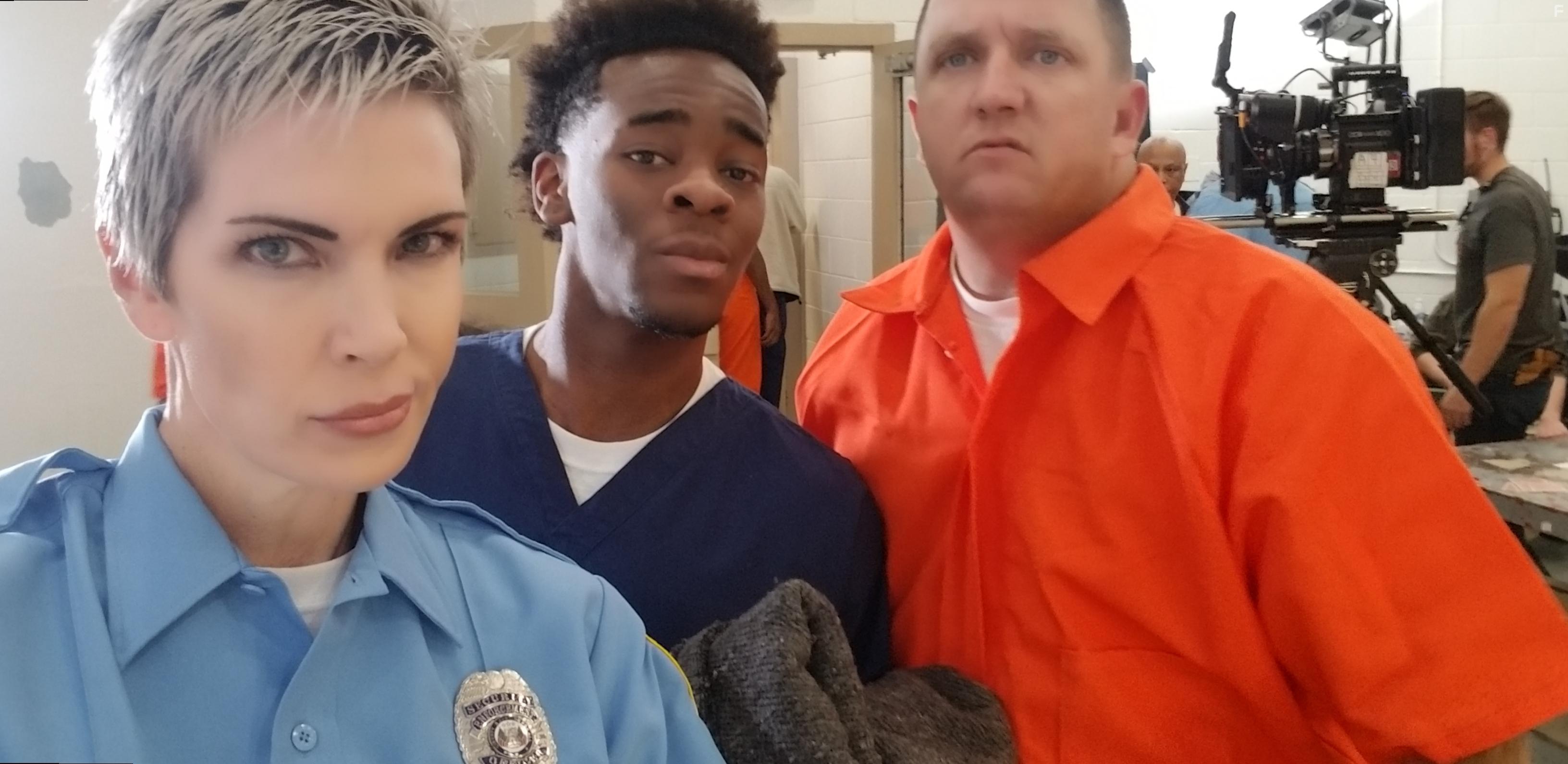 Eaddy Mays, Johann Flores, and Brandon Sampson in Redeemed (2021)