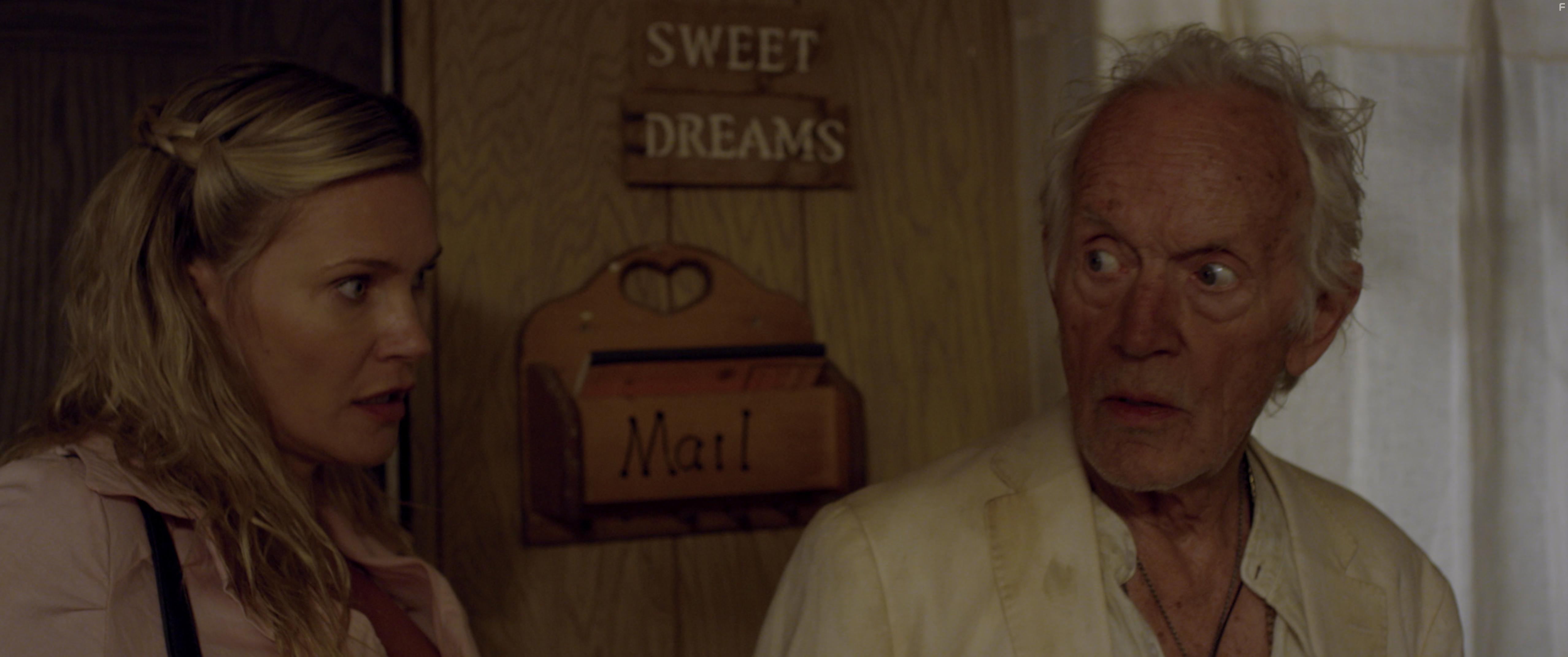 Lance Henriksen and Natasha Henstridge in The Unhealer (2020)