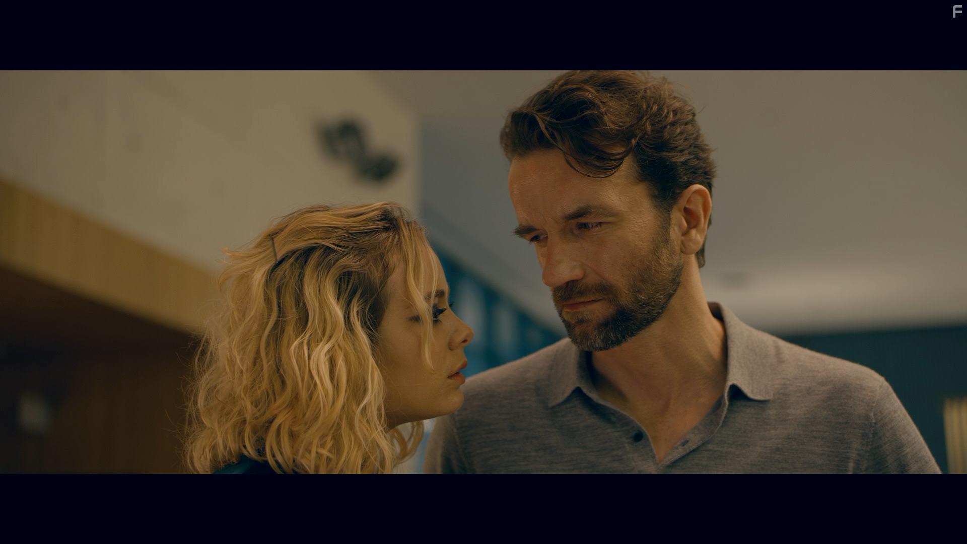 Tomasz Kot and Athena Strates in A Perfect Enemy (2020)