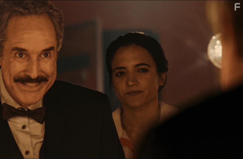 Ron Lynch and Mary Lynn Rajskub in Too Late (2021)