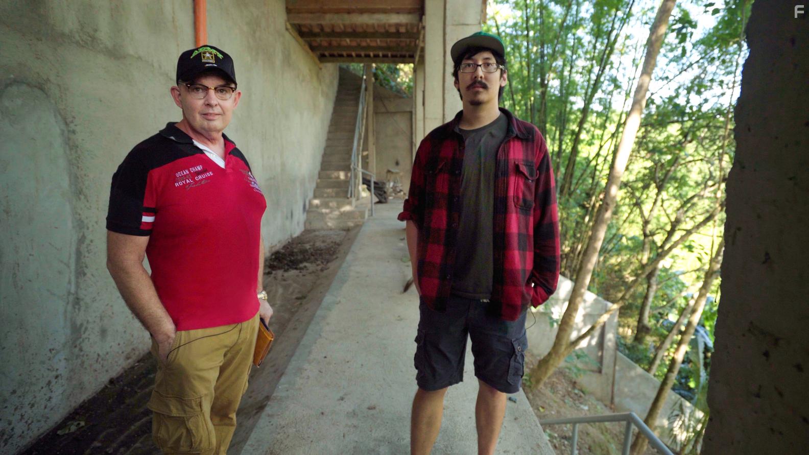 Jim Watkins and Ron Watkins in Q: Into the Storm (2021)