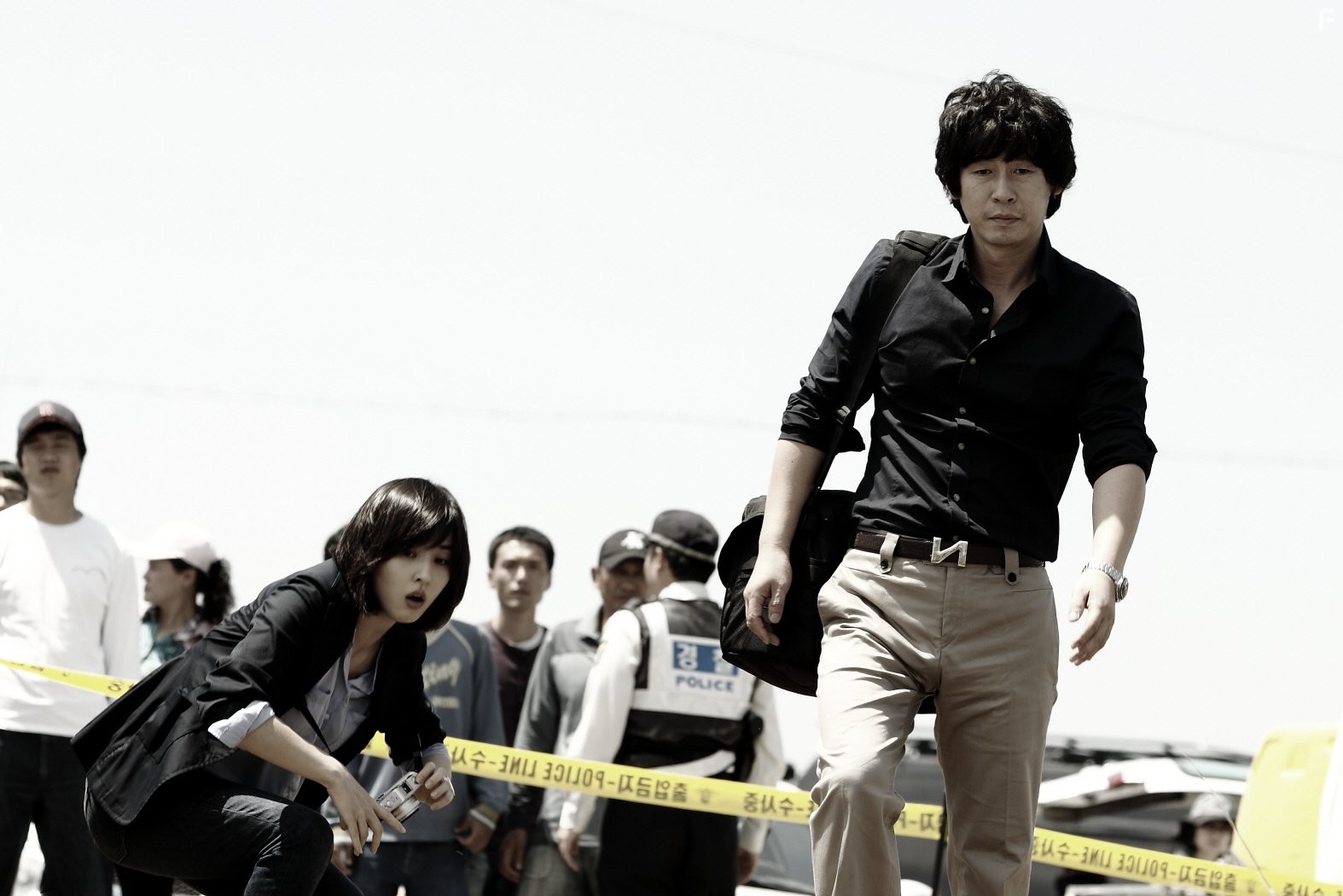 Kyung-gu Sol and Hye-jin Han in Без пощады (2010)