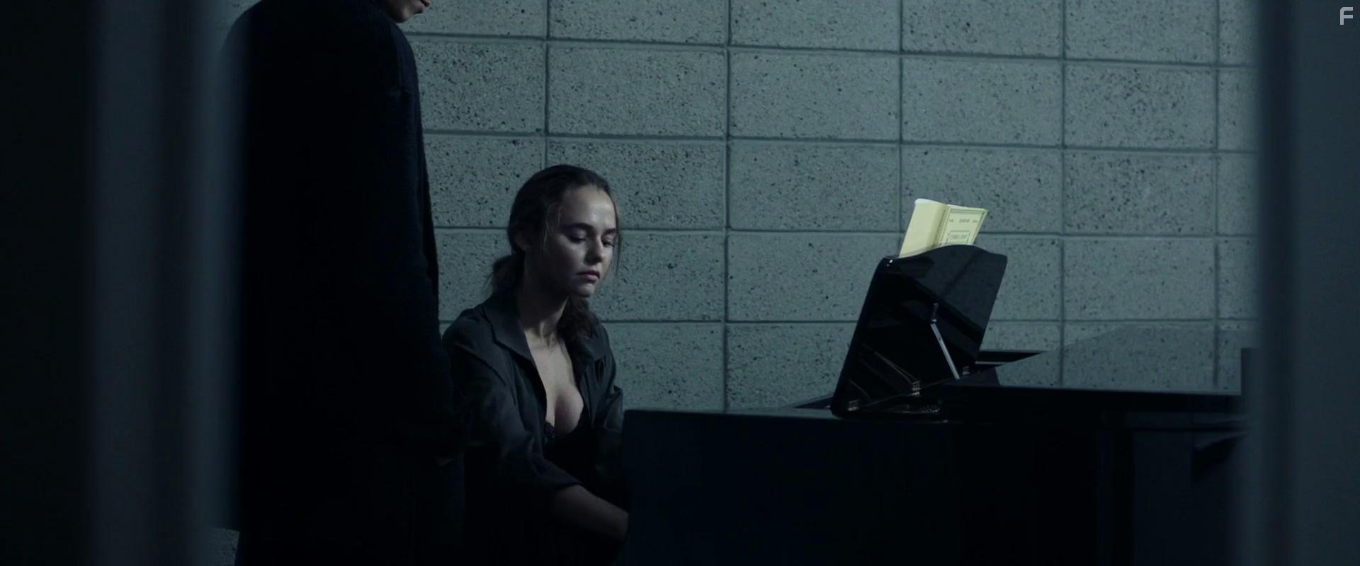 Ivan Shaw and Madison Iseman in Nocturne (2020)