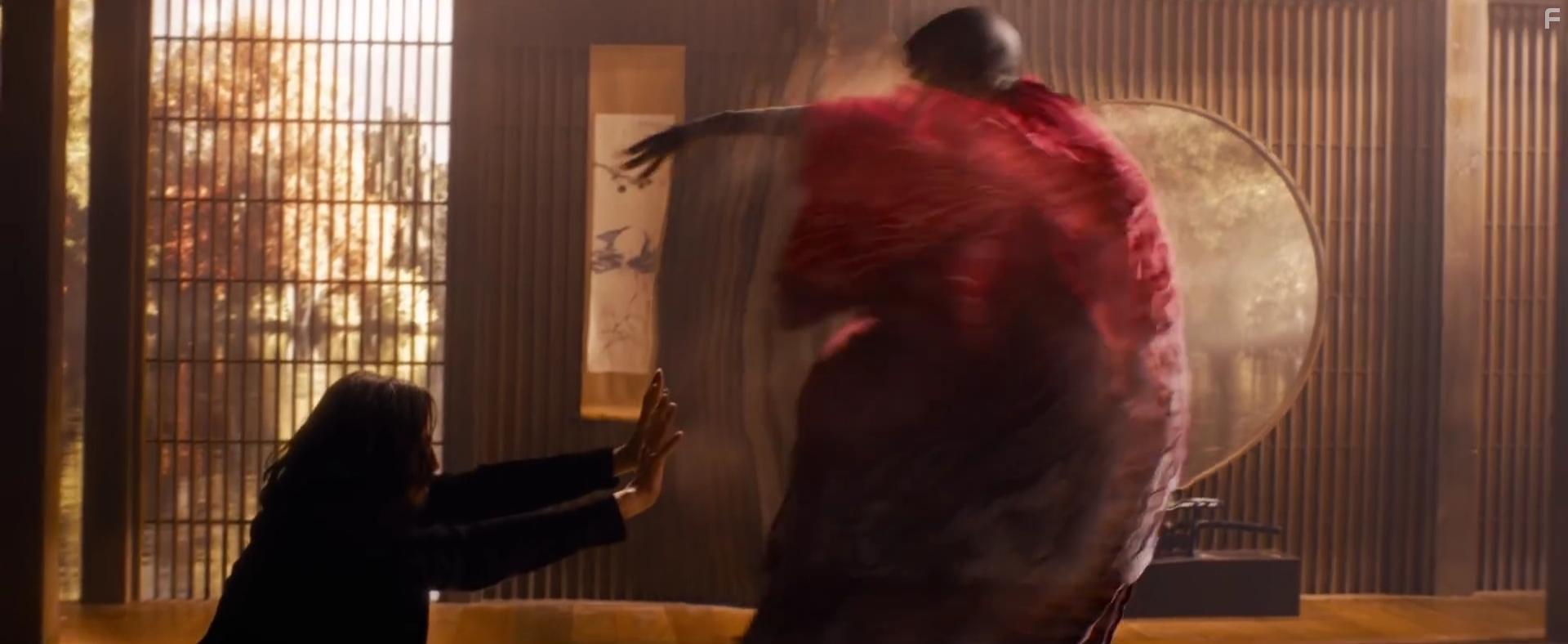 Keanu Reeves and Yahya Abdul-Mateen II in The Matrix Resurrections (2021)