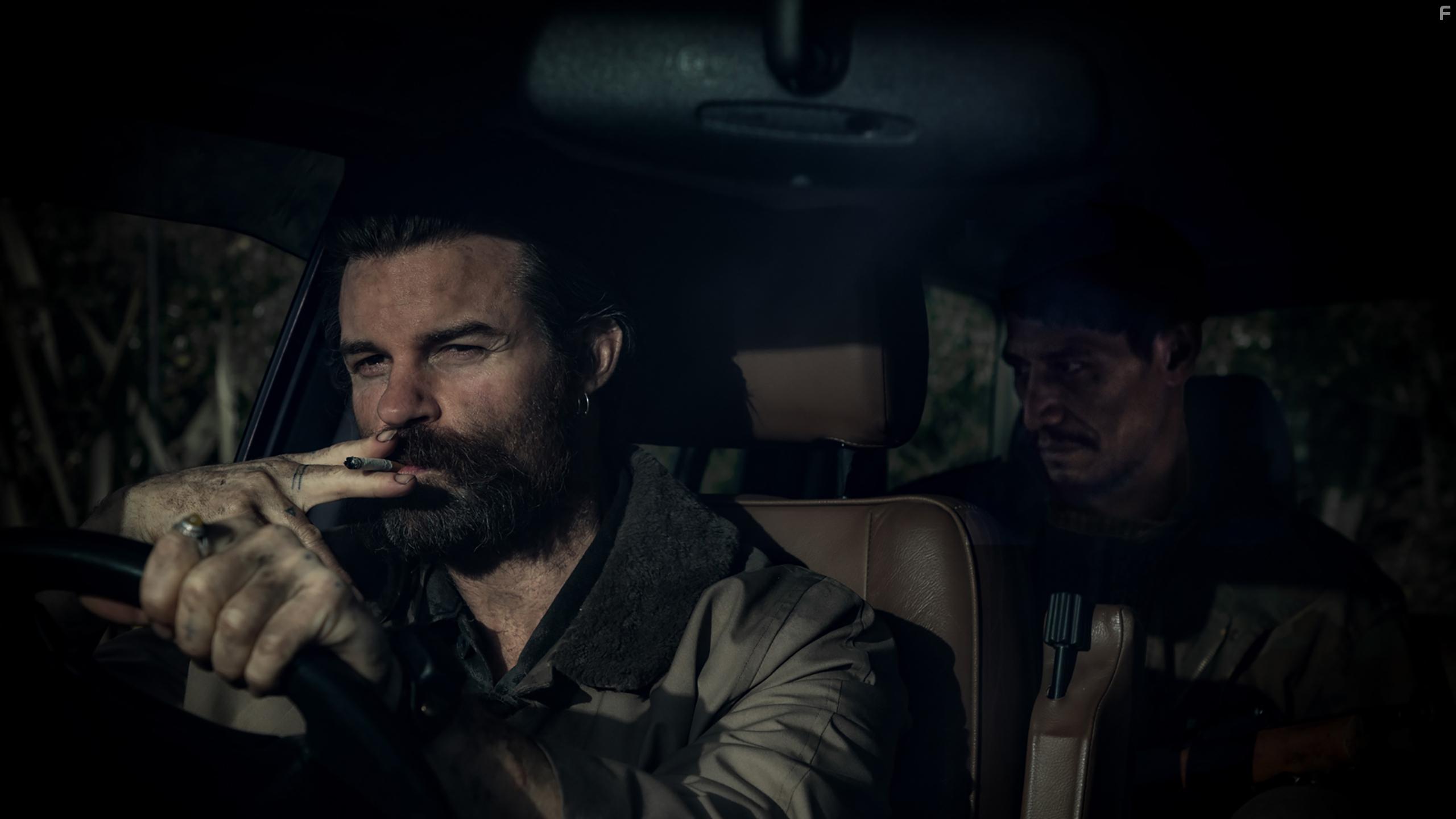 Daniel Gillies and Matthias Luafutu in Coming Home in the Dark (2021)