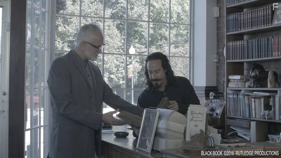 Ari Lehman and Mark A. Nash in The Black Book (2021)
