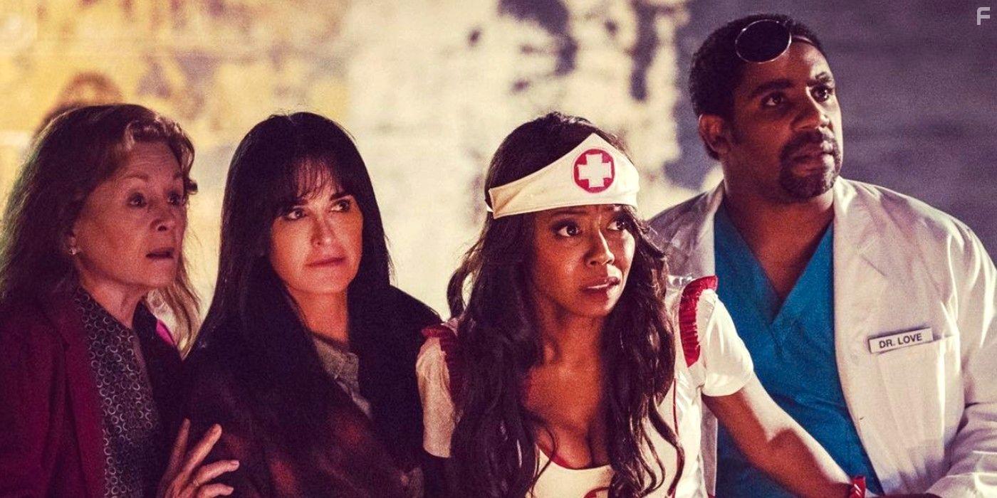 Kyle Richards, Nancy Stephens, Michael Smallwood, and Carmela McNeal in Halloween Kills (2021)