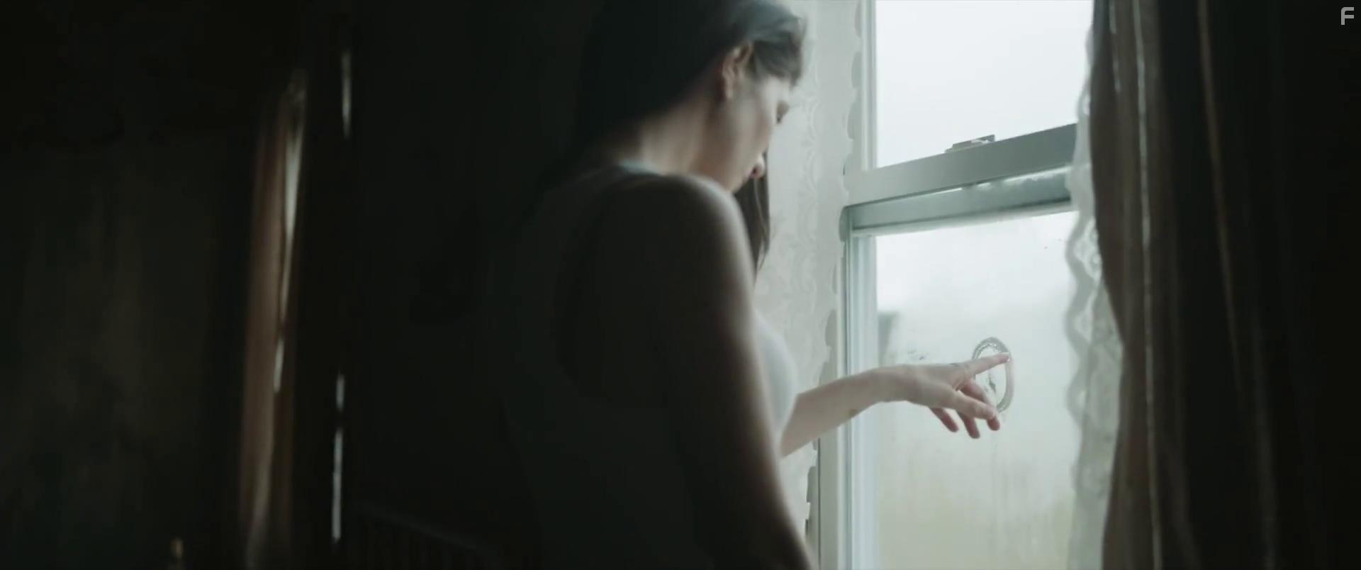 Emily Bader in Paranormal Activity: Next of Kin (2021)