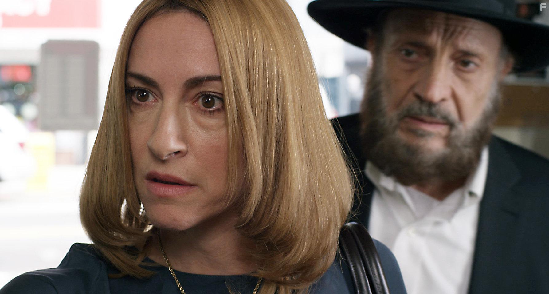 Judi Beecher as Raquel Yehuda, and Jos Laniado as Moshe Yehuda