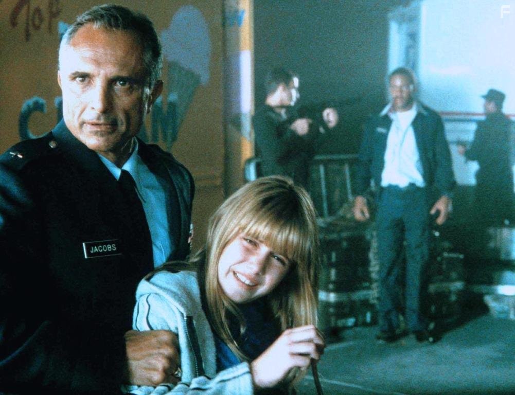 Mystro Clark, Robert Miano, and Yvonne Zima in Storm Catcher (1999)