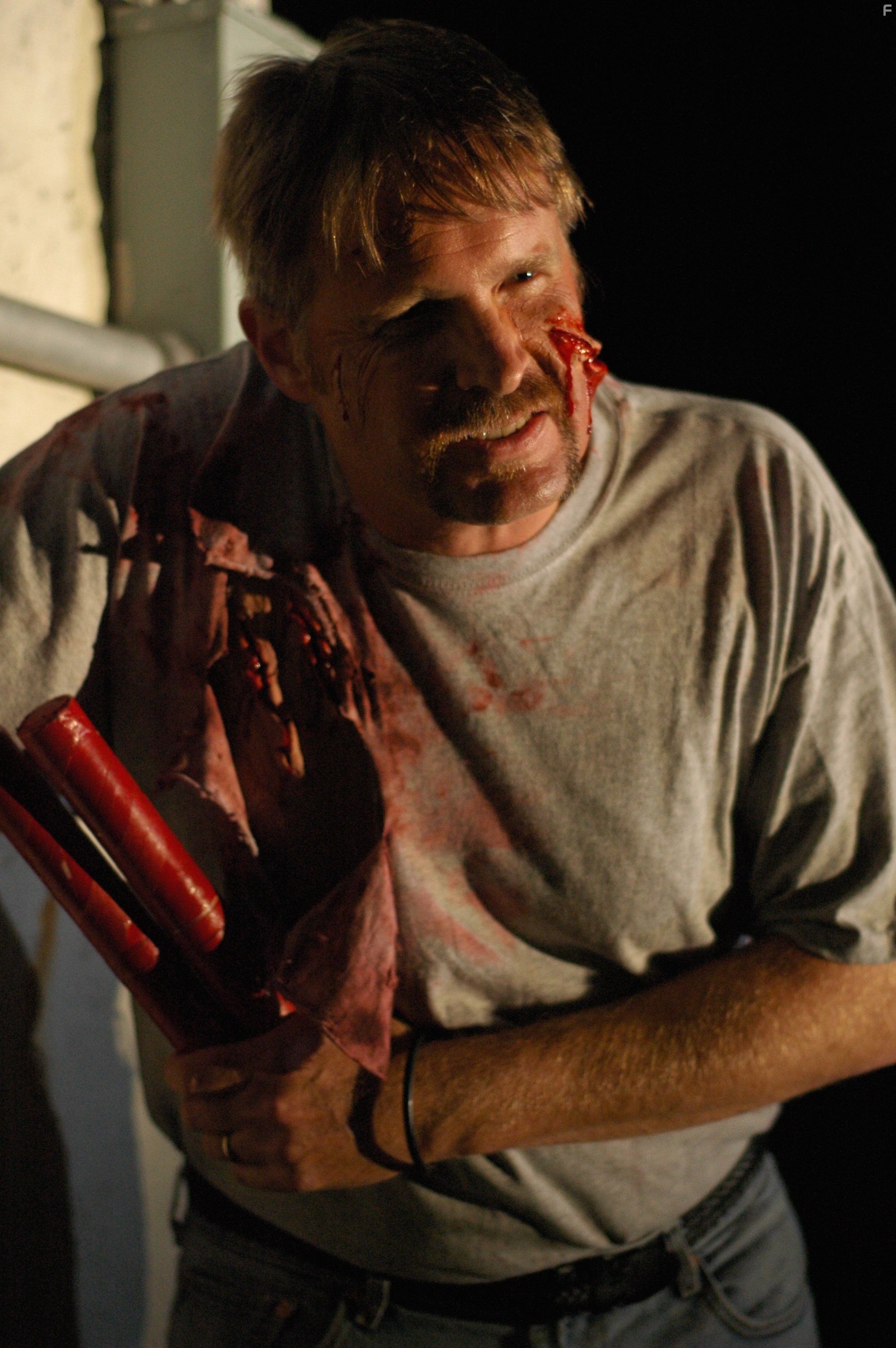 Hank Torrance in Predator Island (2005)