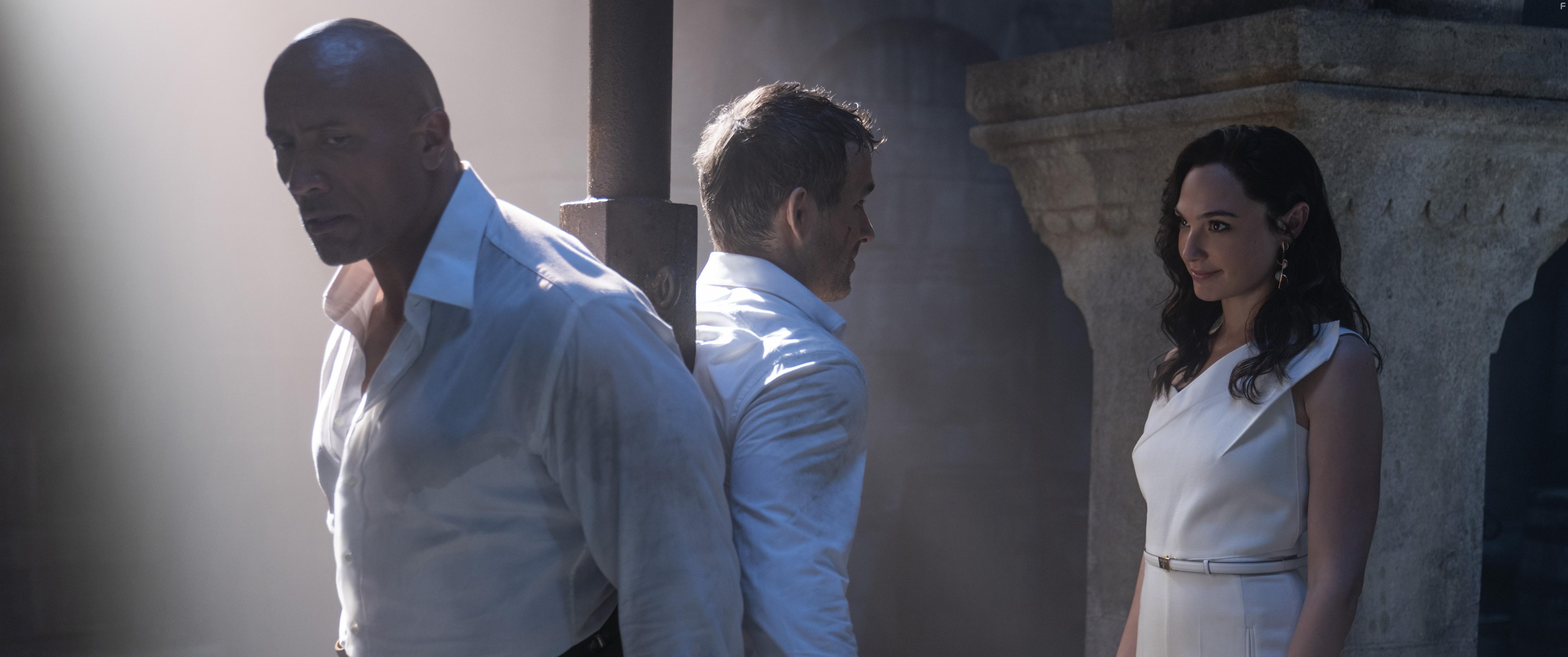 Ryan Reynolds, Dwayne Johnson, and Gal Gadot in Red Notice (2021)