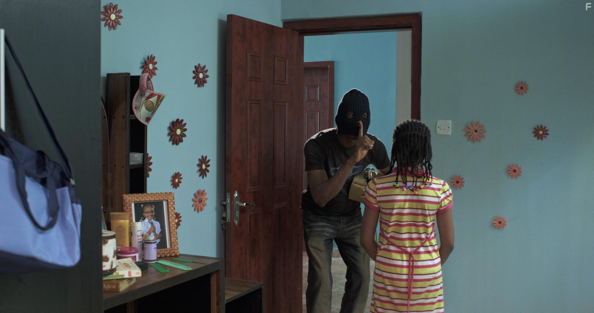 Angel Unigwe and Frank Donga in Three Thieves (2019)