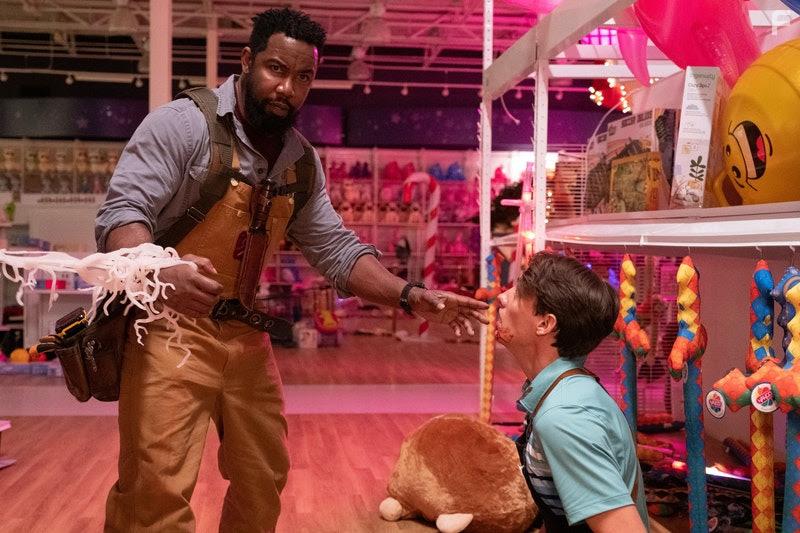 Michael Jai White and Ryan Lee in Black Friday (2021)