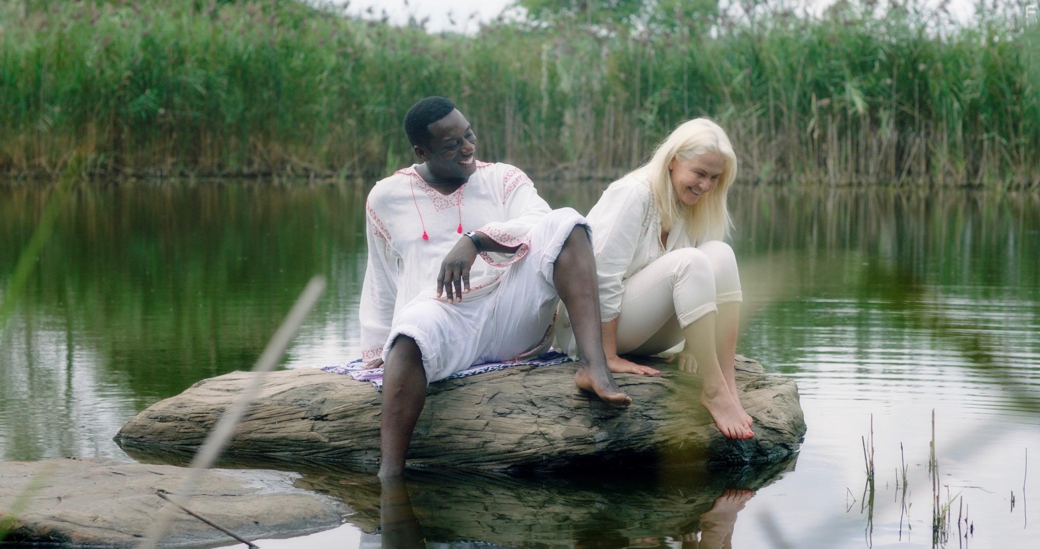 Cornelia Guest and Hakeem Kae-Kazim in The Shuroo Process (2021)