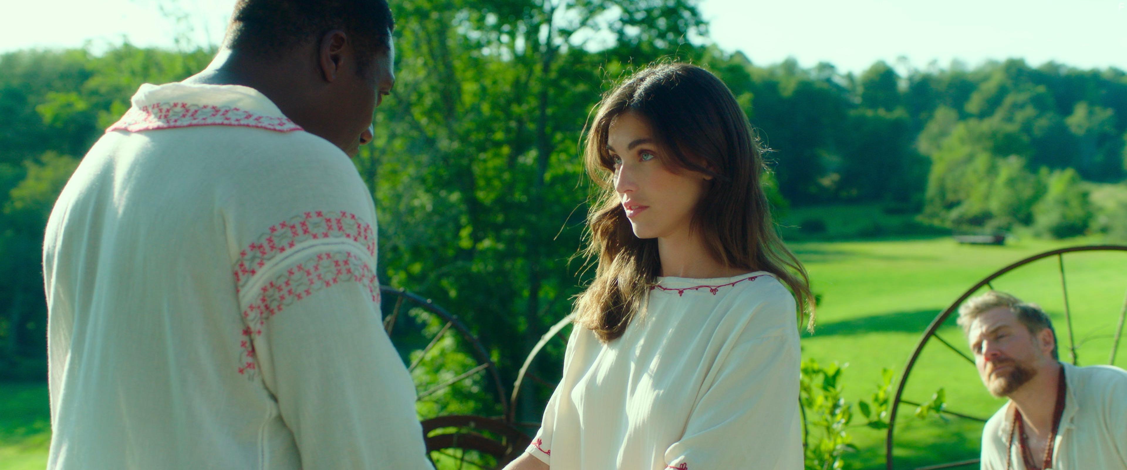 Hakeem Kae-Kazim and Rainey Qualley in The Shuroo Process (2021)