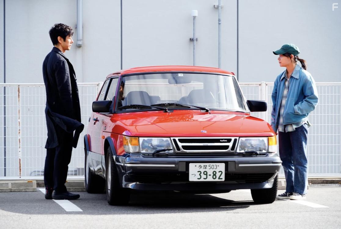 Hidetoshi Nishijima and Tko Miura in Drive My Car (2021)
