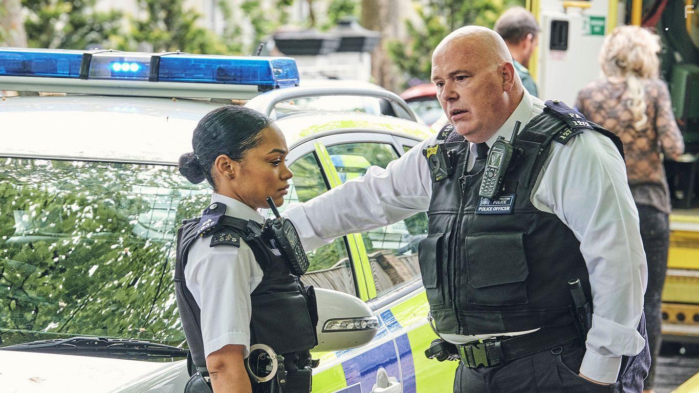 Nick Holder and Tahirah Sharif in The Tower (2021)