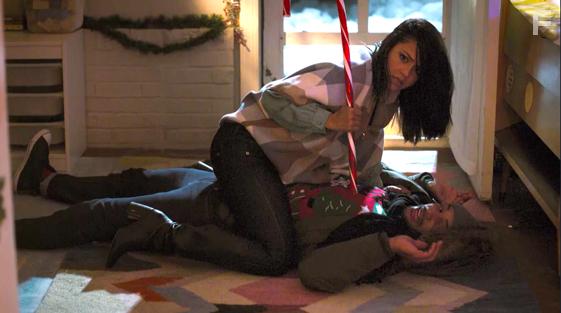 Tristin Mays and Nathan Owens in The Christmas Sitters (2020)