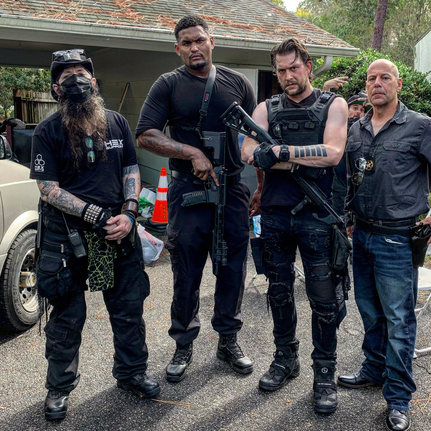 Eric Buarque and Joshua Cavender Cole in American Siege (2021)