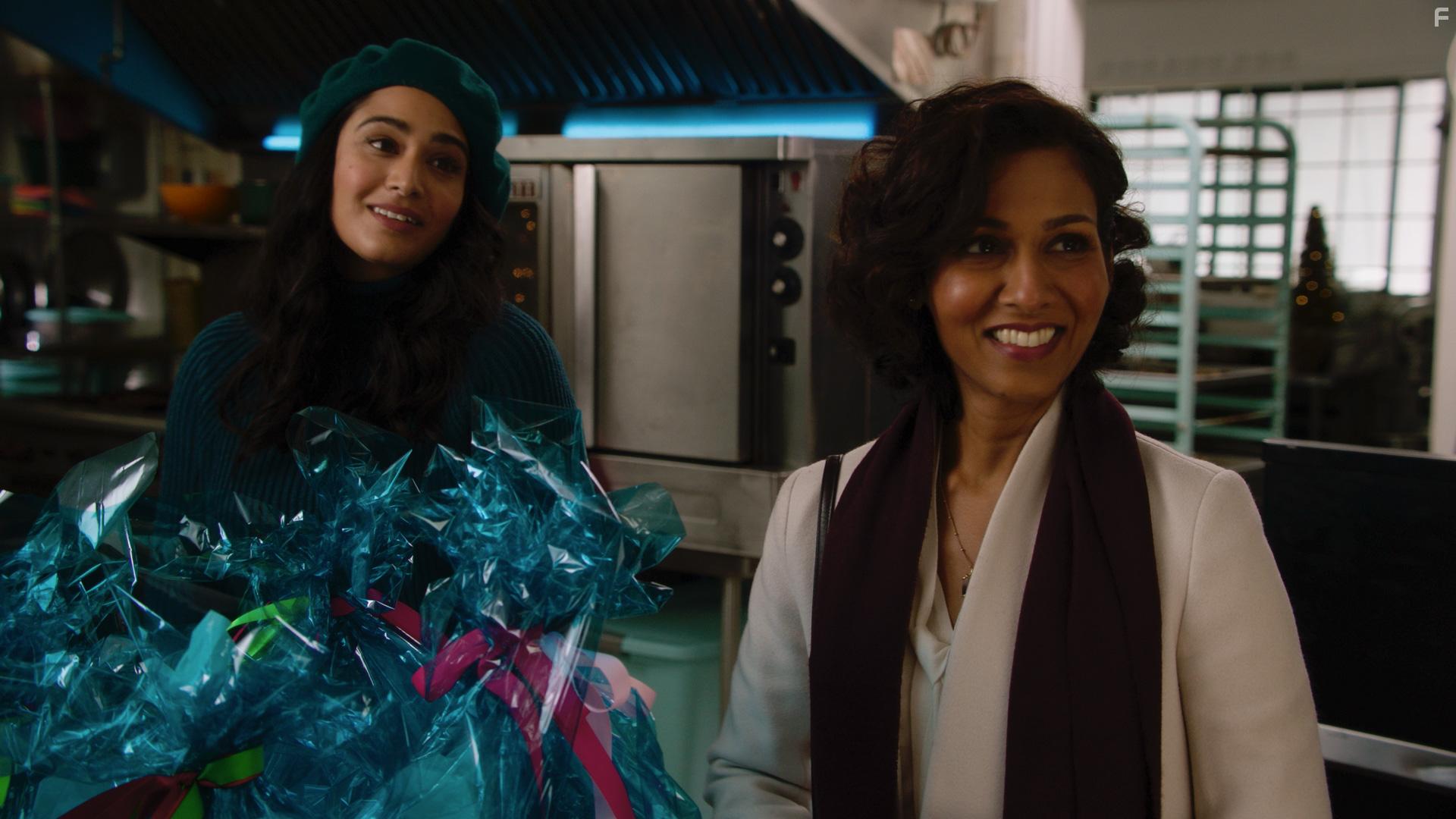 Rekha Sharma and Aadila Dosani in Baking Spirits Bright (2021)