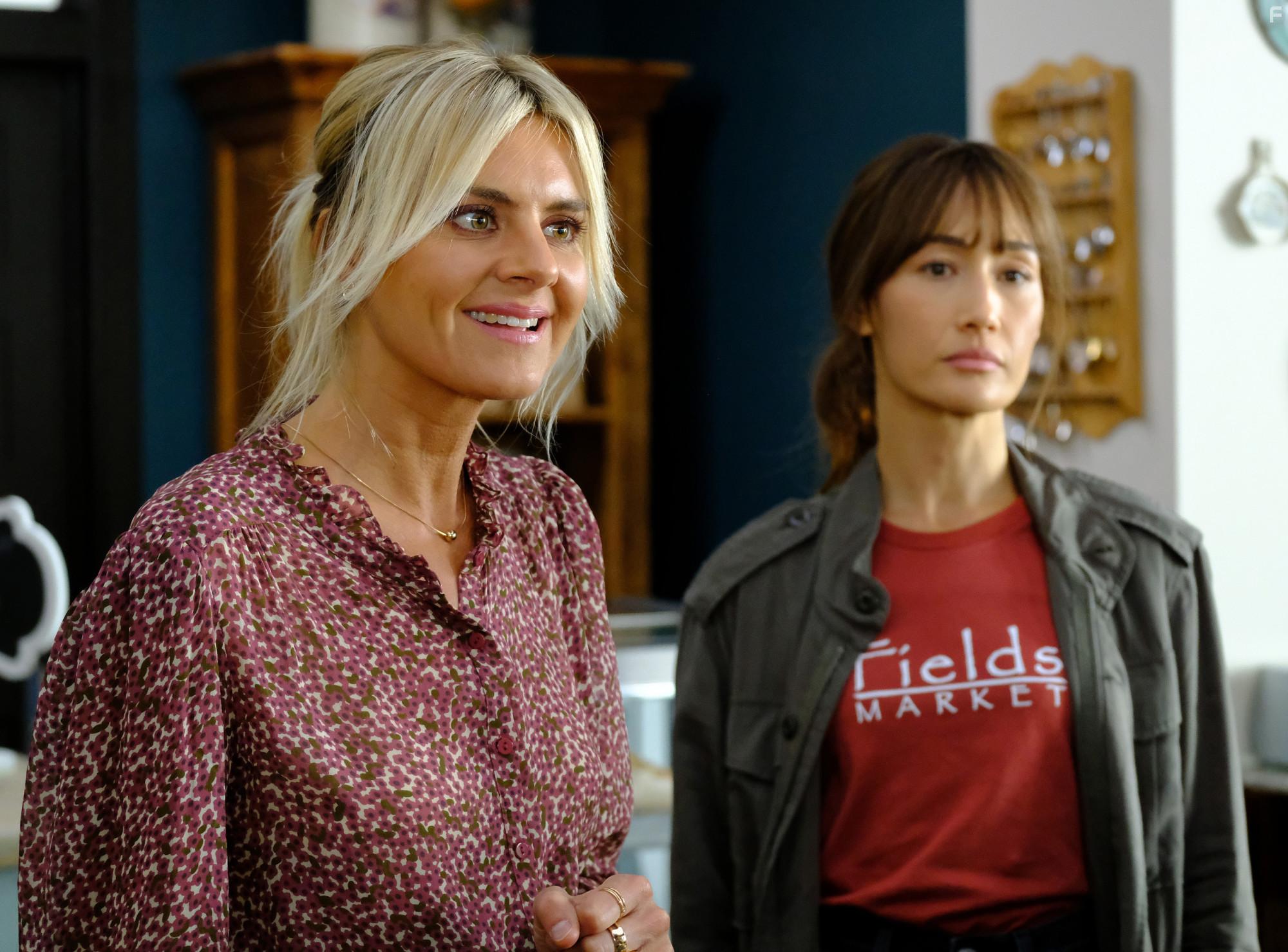 Maggie Q and Eliza Coupe in Pivoting (2022)