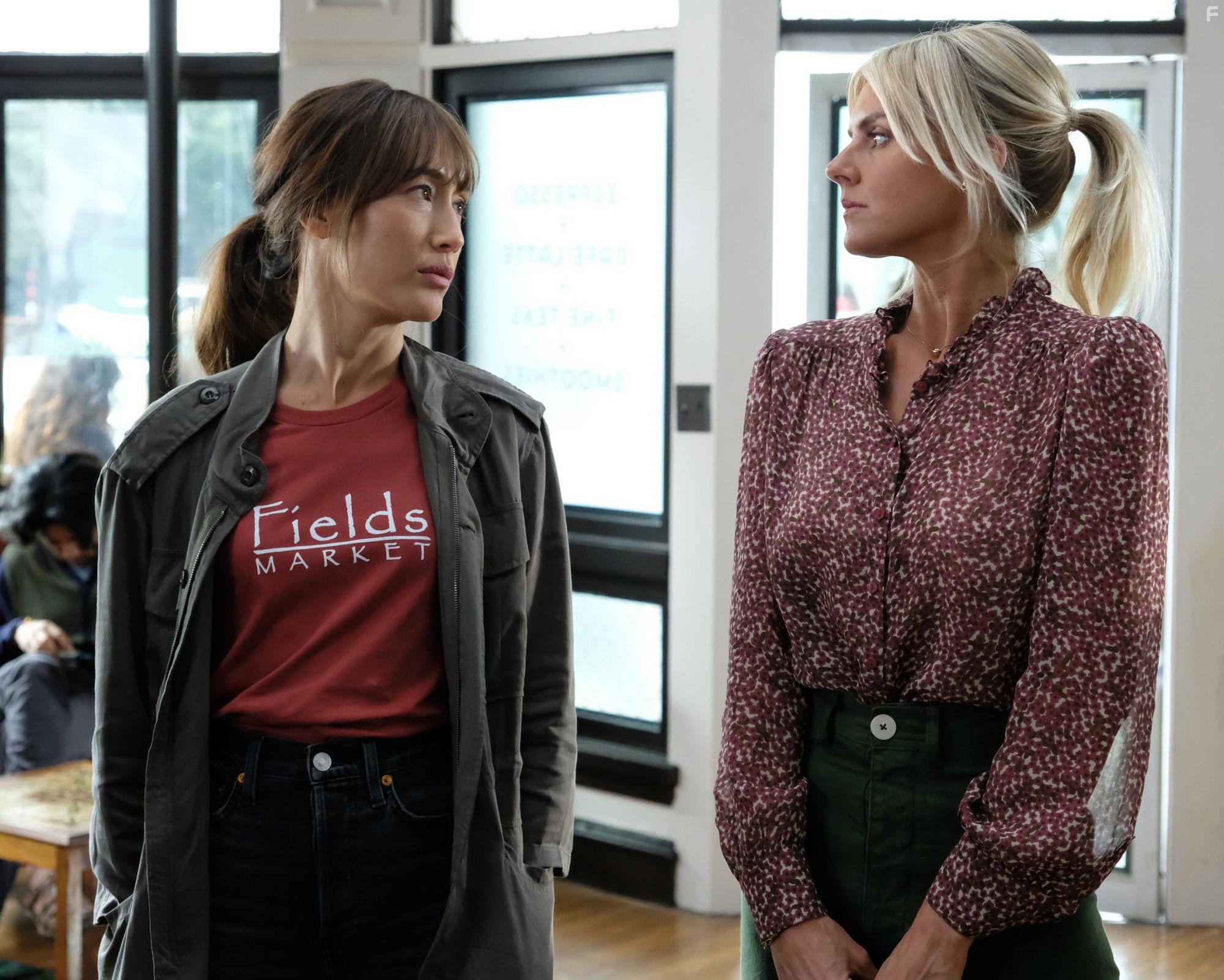 Maggie Q and Eliza Coupe in Pivoting (2022)